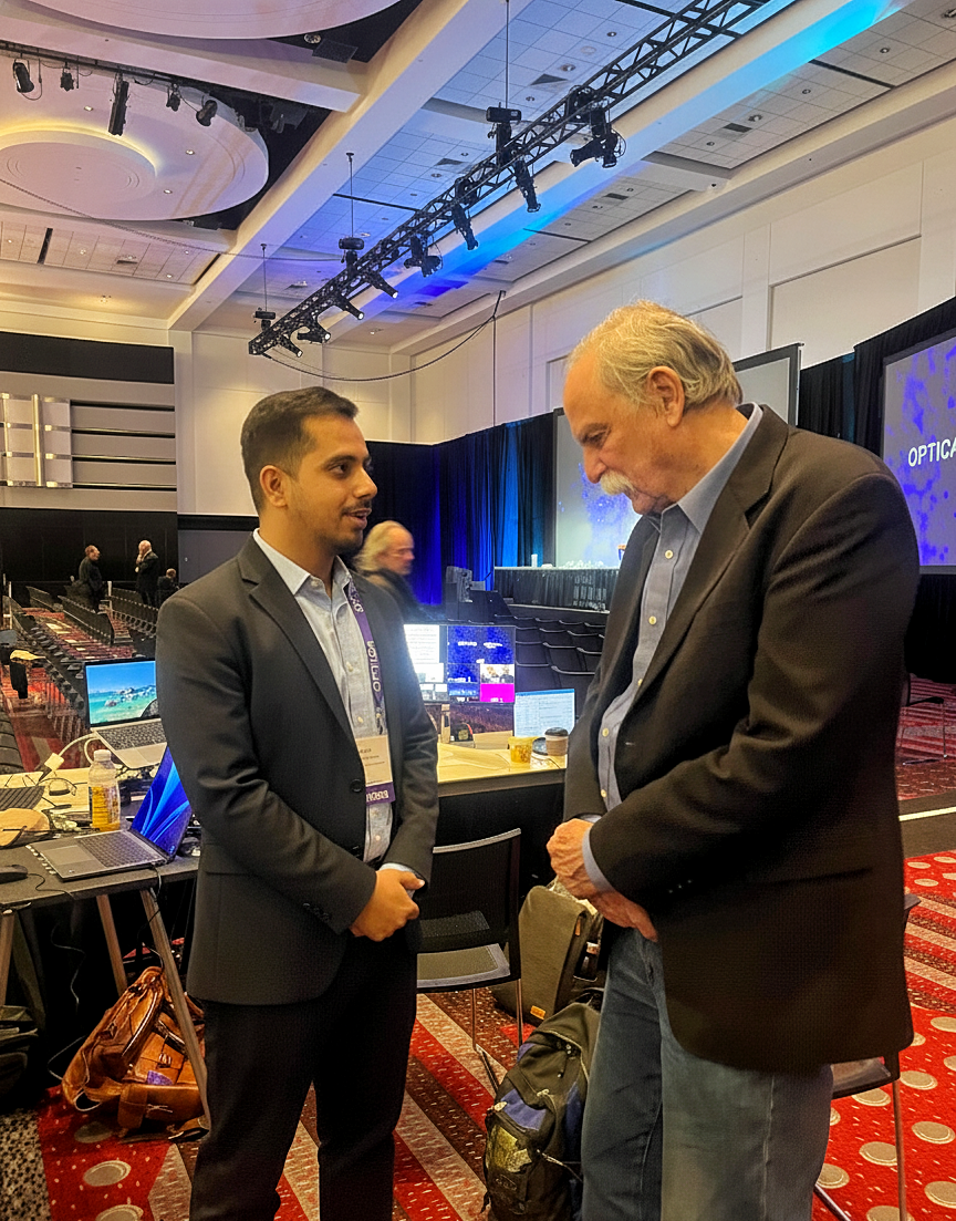 At Optica FioLS with Nobel Laureate David J. Wineland